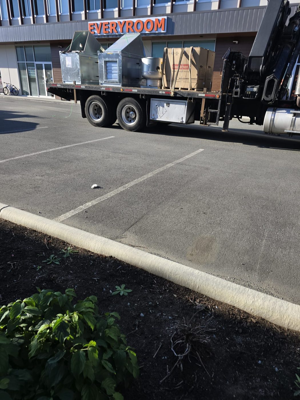 CaptiveAire climate systems and heavy kitchen machinery arriving on an A3 Equipment logistics truck.
